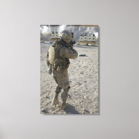 A soldier engages his target on a shooting rang