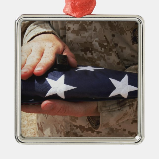 A soldier holds the United States flag Metal Tree Decoration (Front)