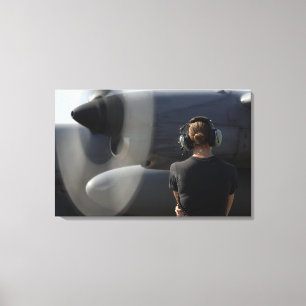 A soldier monitors the performance canvas print