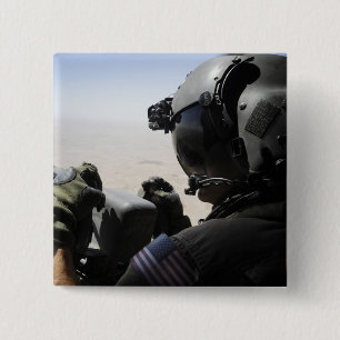 A soldier provides security 15 cm square badge
