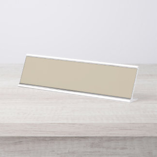 A solid brown background with a smooth, uniform te desk name plate