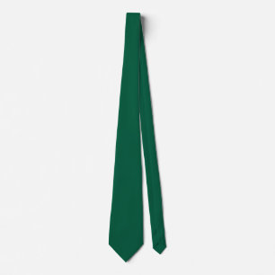 A solid dark green textured background tie