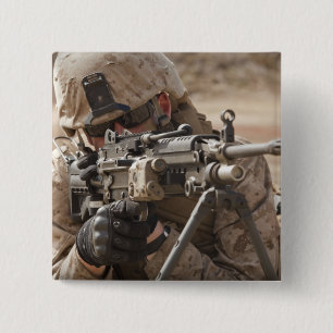 A squad automatic weapon gunner provides securi 15 cm square badge