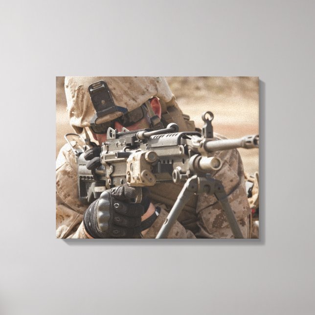 A squad automatic weapon gunner provides securi canvas print (Front)