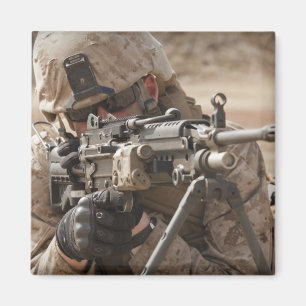 A squad automatic weapon gunner provides securi magnet