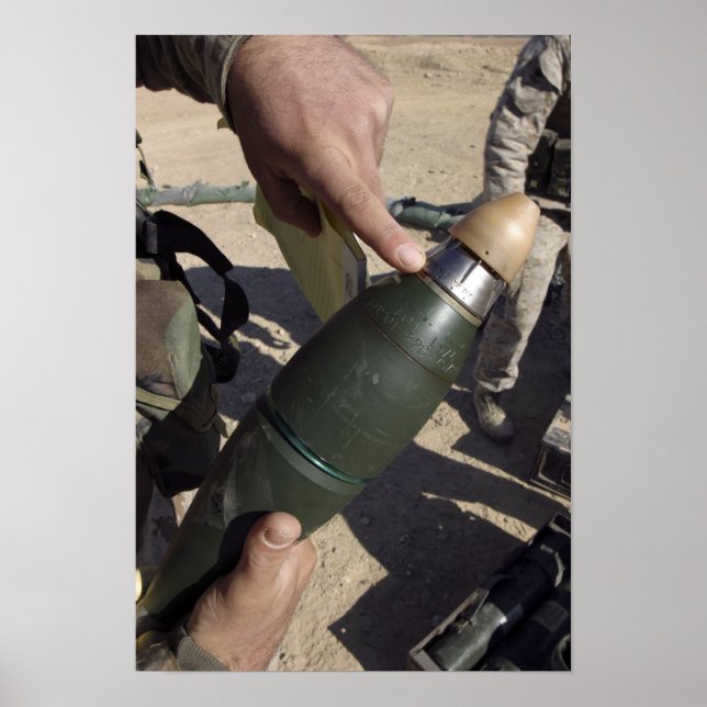 A squad leader points to a delay setting poster (Front)