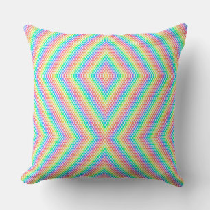A square pillow features a vibrant geometric 