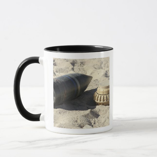 A static display of a converted ordnance shell mug (Left)