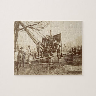 A steam crane in operation during the building of jigsaw puzzle