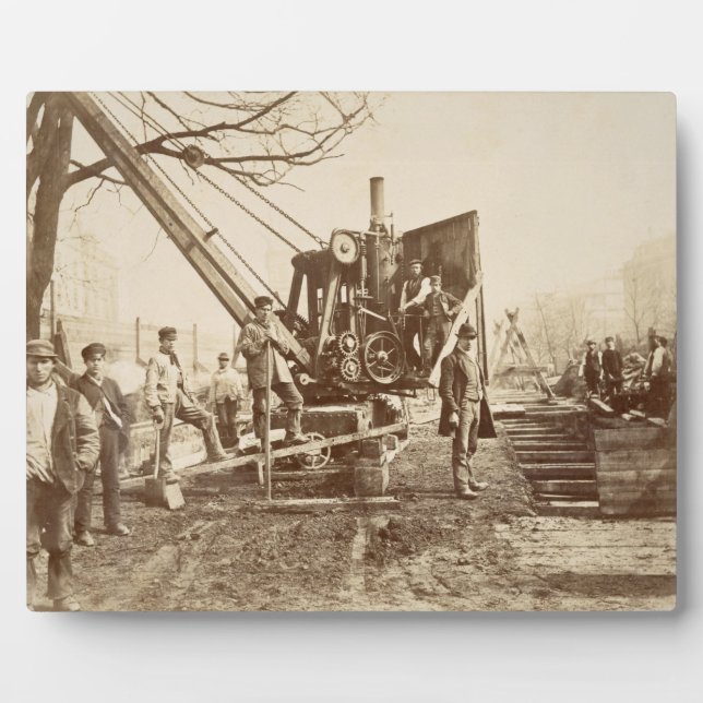 A steam crane in operation during the building of plaque (Front)