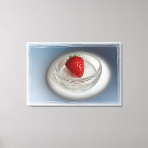 A strawberry in a cup canvas print