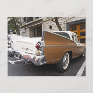 A Studebaker Silver Hawk Classic Car parked on a Postcard
