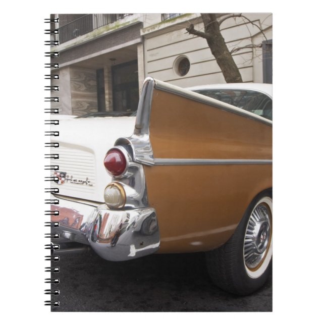 A Studebaker Silver Hawk Classic Car parked on a Spiral Notebook (Front)