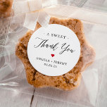 A Sweet Thank You Minimalist Wedding Favour  Classic Round Sticker<br><div class="desc">Make your guests feel appreciated with this Minimalist Wedding Thank You Favour Sticker! The sticker features a simple yet elegant design with the words "thank you" in a beautiful script font. It is perfect for adding a personal touch to your wedding favours, such as candy or small gifts. Use Zazzle's...</div>