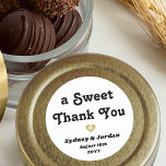A Sweet Thank You Retro Typography Wedding Favour Classic Round Sticker<br><div class="desc">Add a stylish retro touch to wedding reception or bridal shower party favours with "a sweet thank you" custom round stickers. All wording on this template is simple to personalise for treat bag seals or gift tags. The modern black and white design features a gold faux foil heart and groovy...</div>