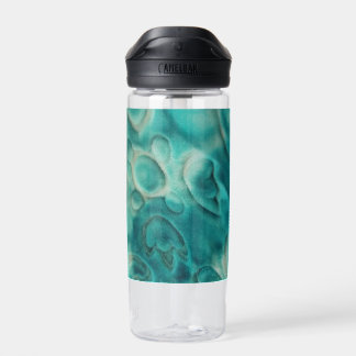 A swirling pattern in teal and light beige water bottle