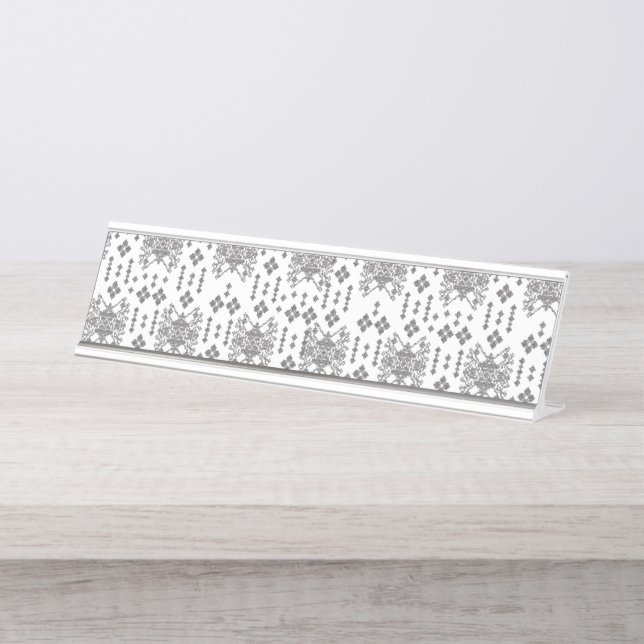 A symmetrical monochrome design featuring intricat desk name plate (Front)