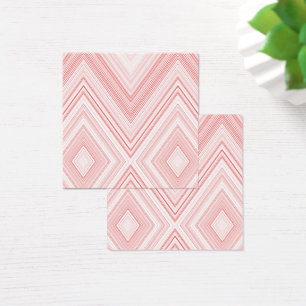 A symmetrical pattern featuring red and pink moti
