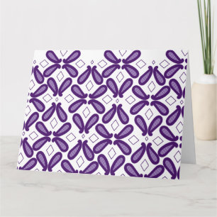 A symmetrical pattern featuring white and purple m card