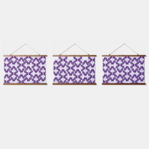 A symmetrical pattern featuring white and purple m hanging tapestry