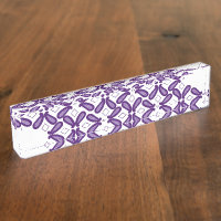 A symmetrical pattern featuring white and purple m