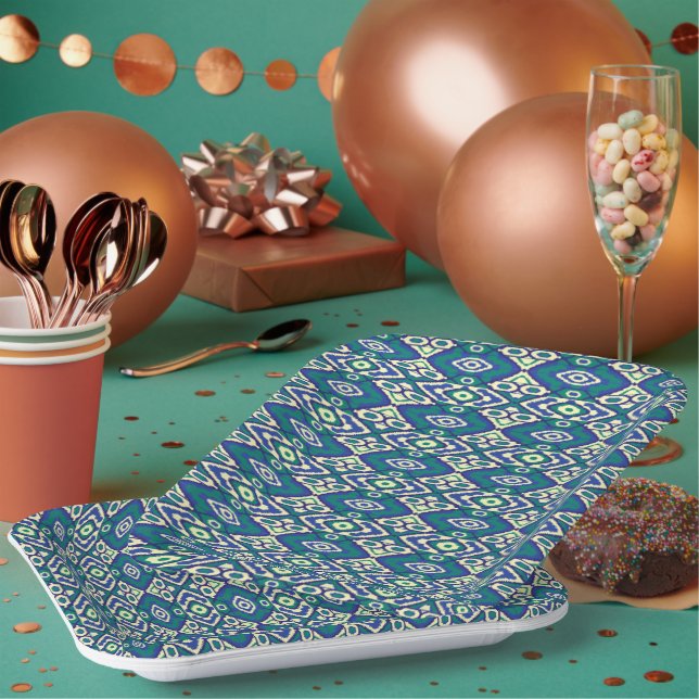 A symmetrical pattern of blue motifs on a textile  paper plate (Multi)