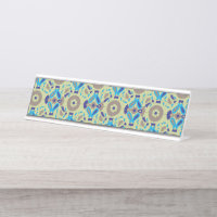 A symmetrical textile design featuring blue and or
