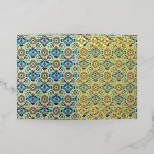 A symmetrical textile design featuring blue and or foil greeting card