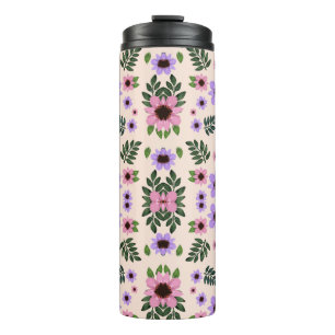 A tall, cylindrical travel mug with a black lid 