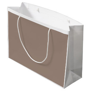 A textured background of various shades of brown, large gift bag