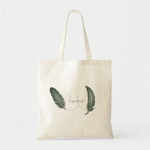 A Tote bag with a minimalist leaf design on it