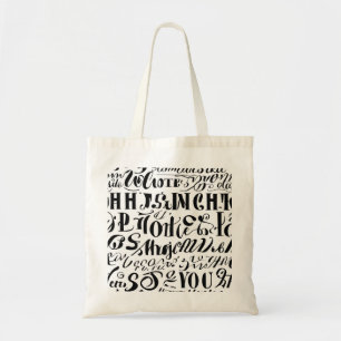 A tote bag with black coloured text on it