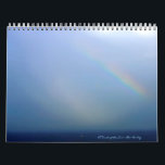 A Touch of the Sun ~ II   Calendar<br><div class="desc">Enjoy many scenes from nature,  including a rainbow over the ocean,   nature's gorgeous flowers and a butterfly and hummingbird.  Reflect on Christmas times together,  and included also is a special capture from our Nation's Capital.  Please contact me for any prints from the pictures.  Thanks for stopping by!</div>