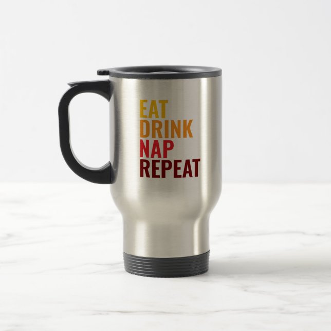 A TRAVEL MUG (Left)