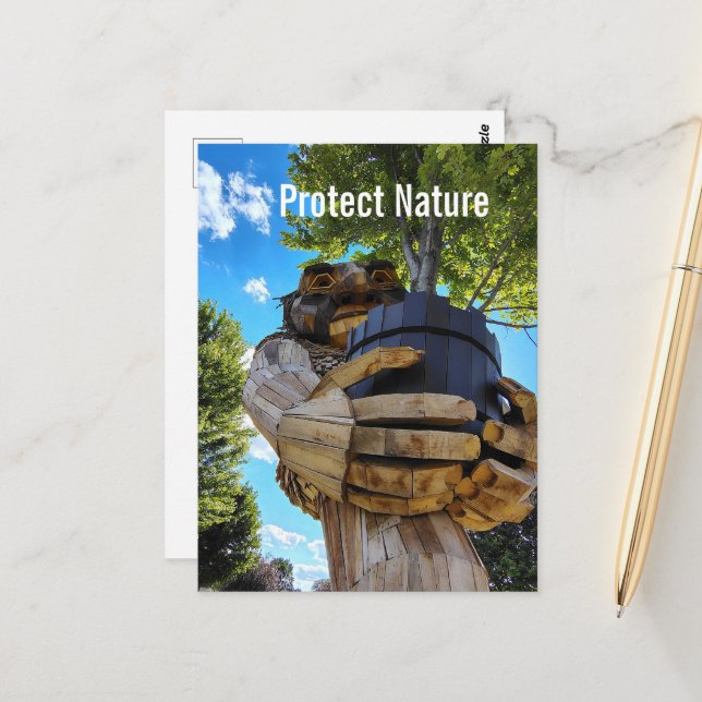 A Troll Holds Up a Tree to Protect Nature Postcard (Front/Back In Situ)