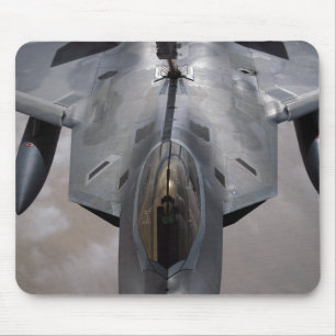 A US Air Force F-22 Raptor is refueled Mouse Pad