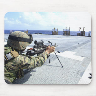 A US Marine adjusting his weapon Mouse Pad