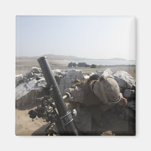 A US Marine fires a mortar in Salinas, Peru Magnet