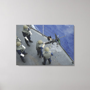 A US Sailor fires a 50-calibre M2HB Canvas Print