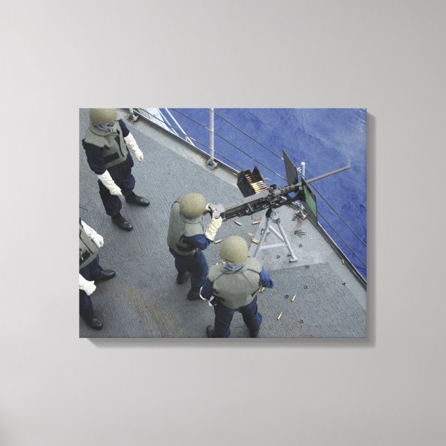 A US Sailor fires a 50-calibre M2HB Canvas Print (Front)