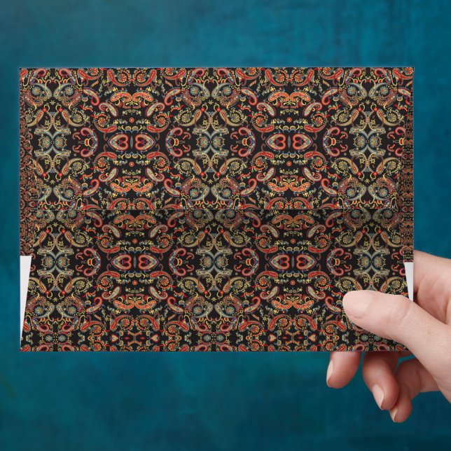 a very ornate pattern with many different colours envelope (Hand)