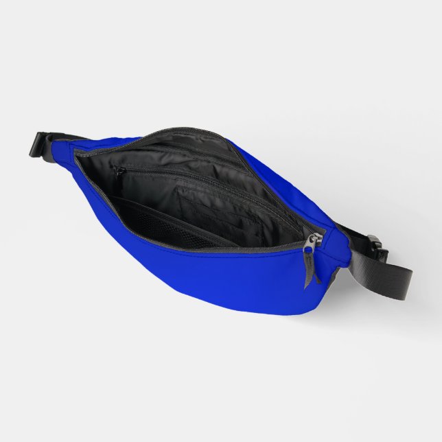 A vibrant blue waist pack with a black zipper  (Open)