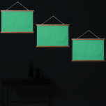 A vibrant green leaf with prominent veins and a de hanging tapestry<br><div class="desc">Capture the beauty of nature with this stunning close-up photograph featuring a vibrant green leaf with prominent veins and a glistening dewdrop at its tip. The leaf is set against a softly blurred background,  making it the perfect piece to add a touch of elegance to any room.</div>