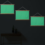 A vibrant green leaf with prominent veins and a de hanging tapestry<br><div class="desc">Capture the beauty of nature with this stunning close-up photograph featuring a vibrant green leaf with prominent veins and a glistening dewdrop at its tip. The leaf is set against a softly blurred background,  making it the perfect piece to add a touch of elegance to any room.</div>