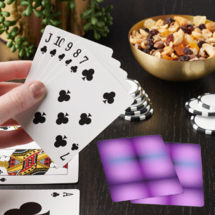 A vibrant purple playing card with a blurred