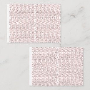 A vibrant rug featuring an intricate geometric mot appointment card