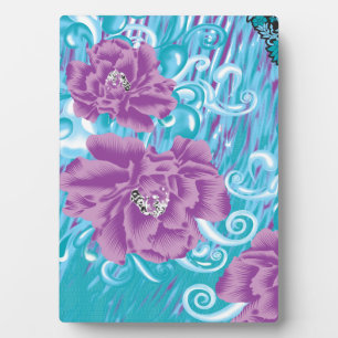 A vibrant textile design featuring purple and turq plaque