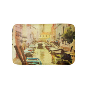 A View Of The Canal With Boats And Buildings Bath Mat