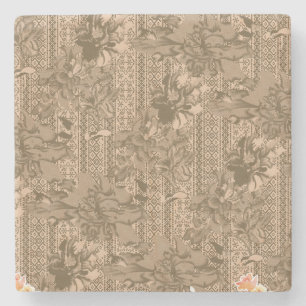 A vintage floral pattern with intricate brown desi stone coaster