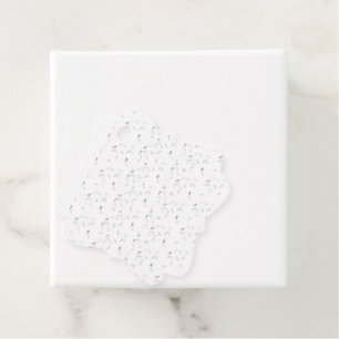 A visually appealing arrangement of white and grey favour tags